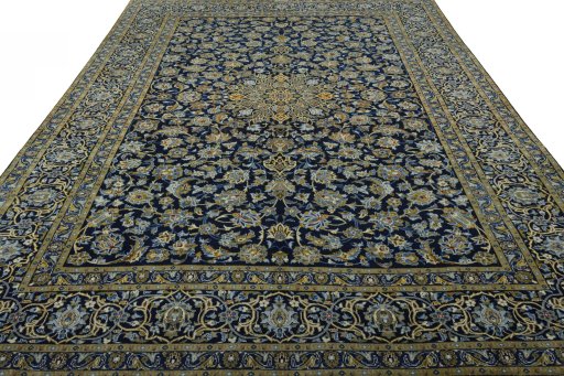 Surface texture of 2000s Kashan rug with natural Wool and intricate pattern