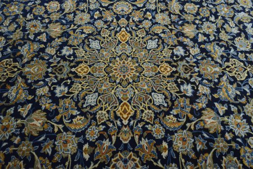 Central medallion detail of 2000s Kashan rug from Iran / Persia