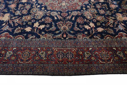 Corner detail of 1930s Kashan rug showing border pattern and Wool pile