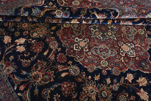Close-up detail of 1930s Kashan rug from Iran / Persia showing Wool weave