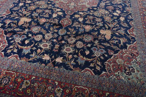 Close-up detail of 1930s Kashan rug from Iran / Persia showing Wool weave