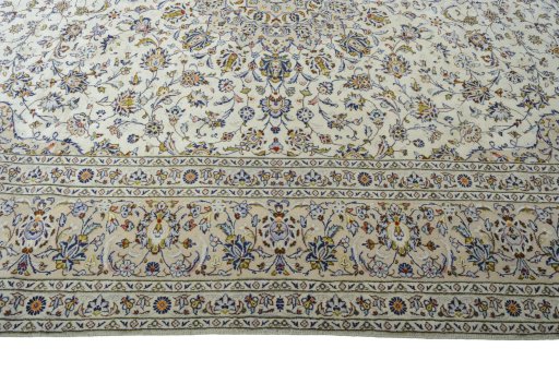Corner detail of New Kashan rug showing border pattern and Wool pile