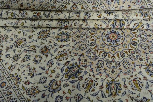Close-up detail of New Kashan rug from Iran / Persia showing Wool weave
