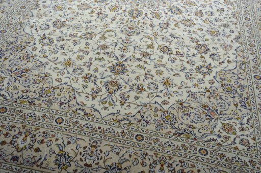 Close-up detail of New Kashan rug from Iran / Persia showing Wool weave