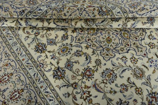 Close-up detail of 2000s Kashan rug from Iran / Persia showing Wool weave