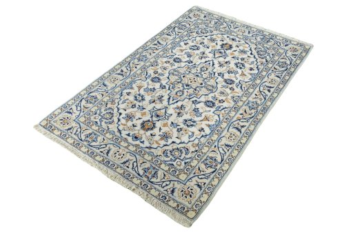 Corner detail of New Kashan rug showing border pattern and Wool pile
