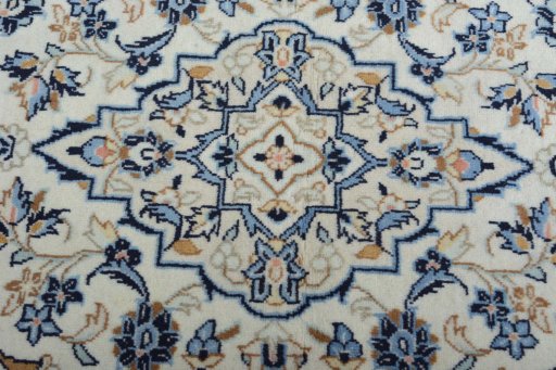 Central medallion detail of New Kashan rug from Iran / Persia