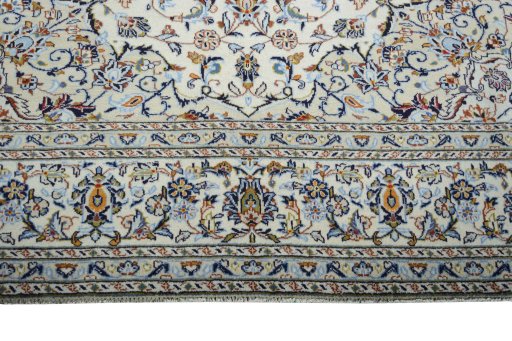 Close-up detail of 2000s Kashan rug from Iran / Persia showing Wool weave