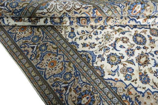 Close-up detail of 2000s Kashan rug from Iran / Persia showing Wool weave