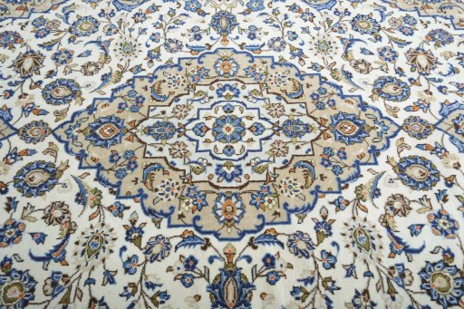 Central medallion detail of 2000s Kashan rug from Iran / Persia
