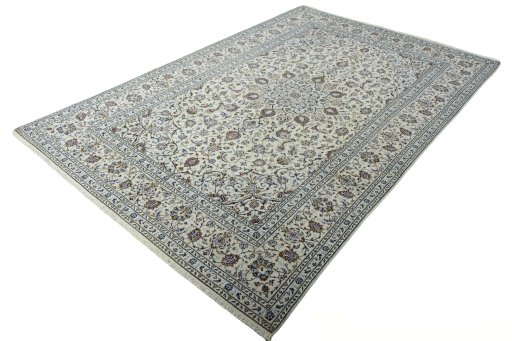 Corner detail of 2000s Kashan rug showing border pattern and Wool pile