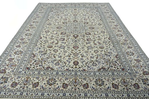 Surface texture of 2000s Kashan rug with natural Wool and intricate pattern