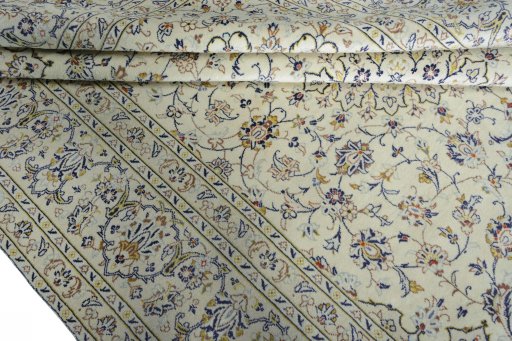 Close-up detail of 2000s Kashan rug from Iran / Persia showing Wool weave