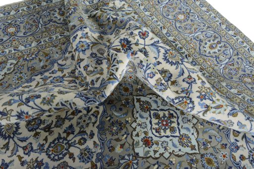 Surface texture of 2000s Kashan rug with natural Wool and intricate pattern