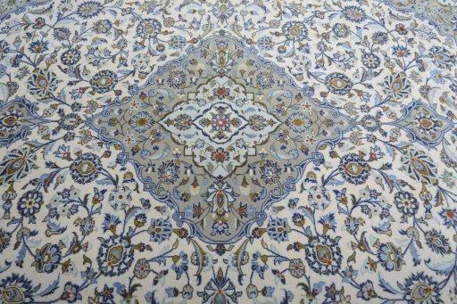 Central medallion detail of 2000s Kashan rug from Iran / Persia