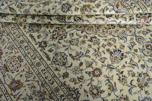 Close-up detail of 2000s Kashan rug from Iran / Persia showing Wool weave