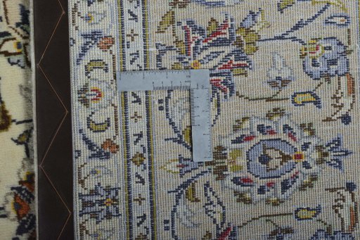 Backside of handmade 2000s Kashan rug showing knot structure and weave density