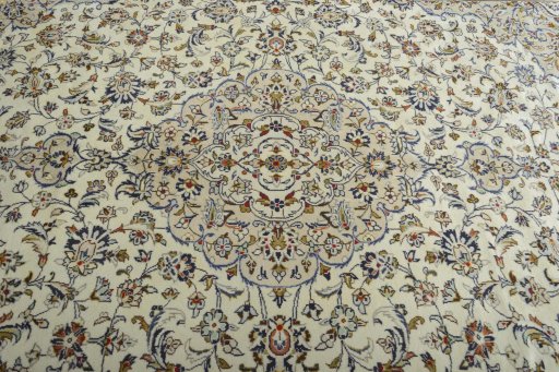Central medallion detail of 2000s Kashan rug from Iran / Persia