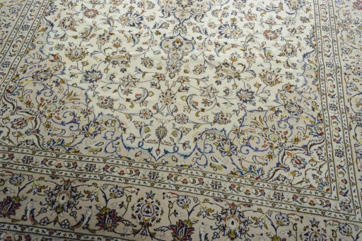 Close-up detail of 2000s Kashan rug from Iran / Persia showing Wool weave