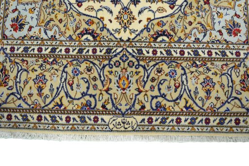 Corner detail of New Kashan rug showing border pattern and Cork pile