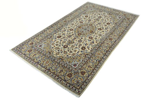 Corner detail of New Kashan rug showing border pattern and Cork pile