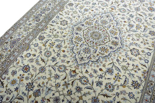 Backside of handmade New Kashan rug showing knot structure and weave density