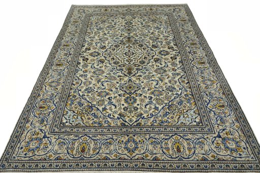 Surface texture of 2000s Kashan rug with natural Wool and intricate pattern