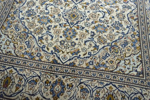 Close-up detail of 2000s Kashan rug from Iran / Persia showing Wool weave