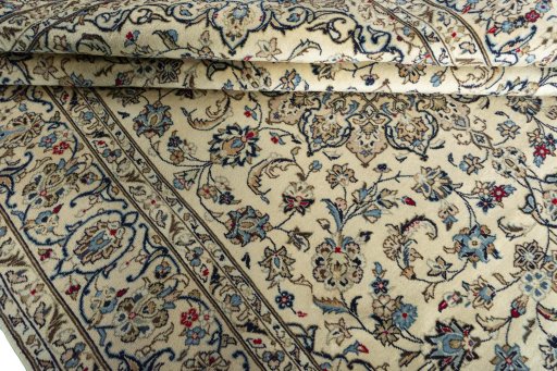 Close-up detail of 2000s Kashan rug from Iran / Persia showing Wool weave