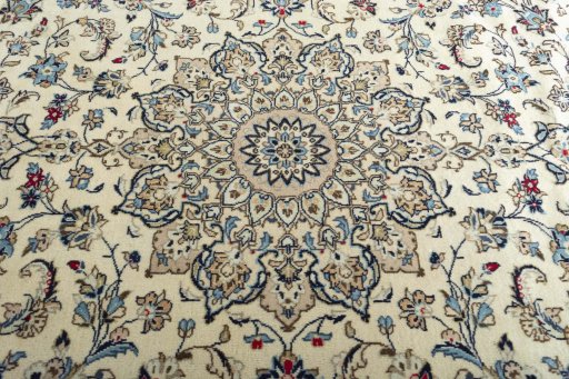 Central medallion detail of 2000s Kashan rug from Iran / Persia