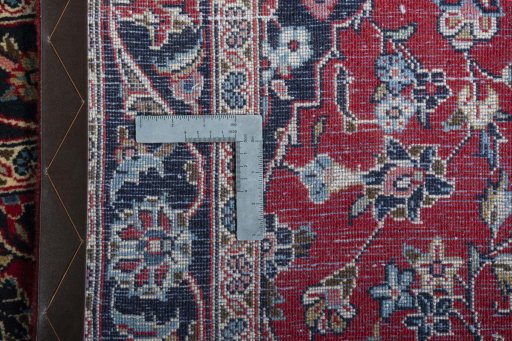 Close-up detail of 2000s Kashan rug from Iran / Persia showing Wool weave