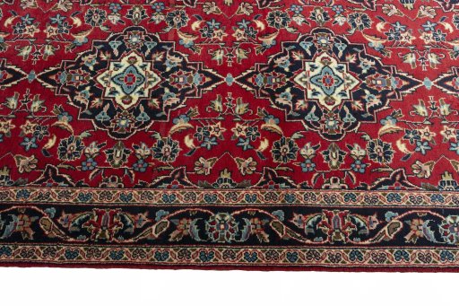 Close-up detail of 2000s Kashan rug from Iran / Persia showing Wool weave