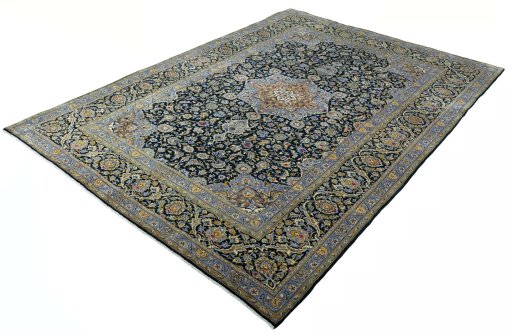 Corner detail of New Kashan rug showing border pattern and Cork pile