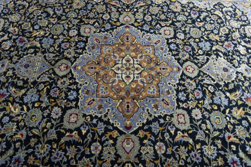 Central medallion detail of New Kashan rug from Iran / Persia