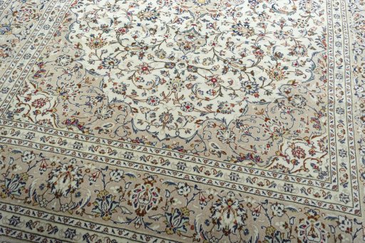 Close-up detail of 2000s Kashan rug from Iran / Persia showing Wool weave