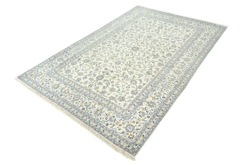 Corner detail of New Kashan rug showing border pattern and Cork pile