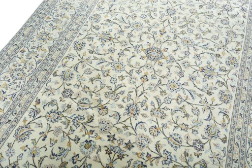 Backside of handmade New Kashan rug showing knot structure and weave density