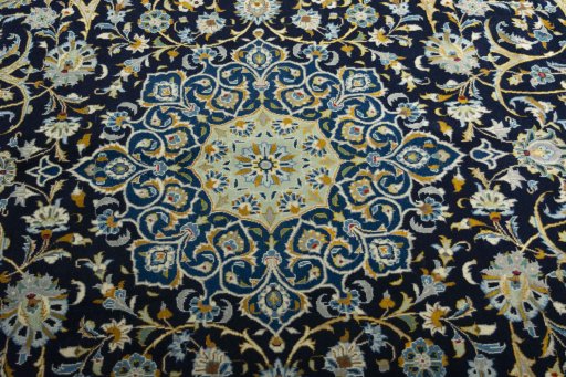 Central medallion detail of 2000s Kashan rug from Iran / Persia