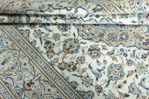Close-up detail of 2000s Kashan rug from Iran / Persia showing Wool weave