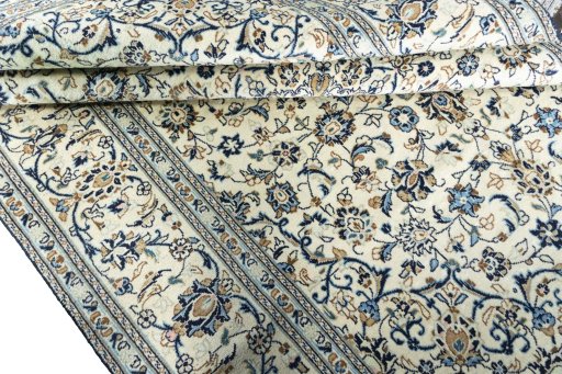 Close-up detail of 2000s Kashan rug from Iran / Persia showing Wool weave