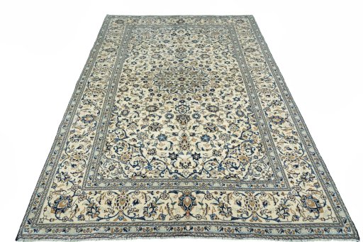 Surface texture of 2000s Kashan rug with natural Wool and intricate pattern