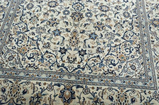 Close-up detail of 2000s Kashan rug from Iran / Persia showing Wool weave