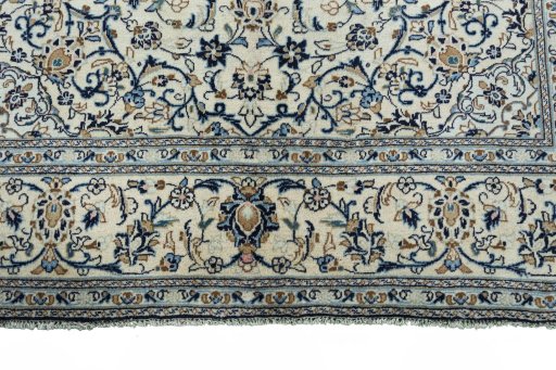 Full view of 2000s Kashan rug from Iran / Persia, 305 × 194 cm in Beige tones