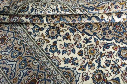 Close-up detail of 2000s Kashan rug from Iran / Persia showing Wool weave