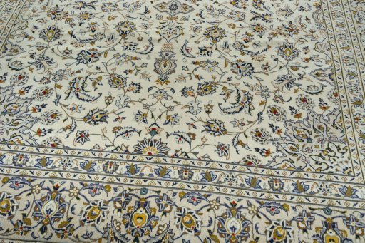Close-up detail of 2000s Kashan rug from Iran / Persia showing Wool weave