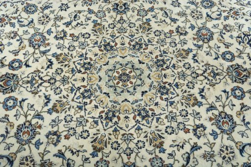 Central medallion detail of 2000s Kashan rug from Iran / Persia