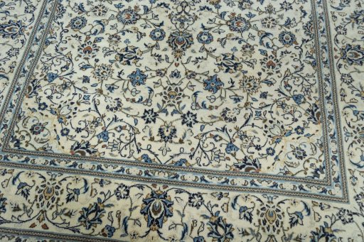 Close-up detail of 2000s Kashan rug from Iran / Persia showing Wool weave