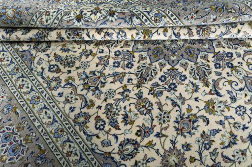 Close-up detail of 2000s Kashan rug from Iran / Persia showing Wool weave