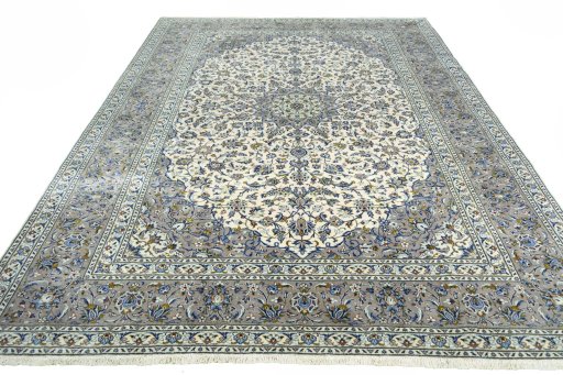 Surface texture of 2000s Kashan rug with natural Wool and intricate pattern