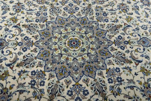 Central medallion detail of 2000s Kashan rug from Iran / Persia